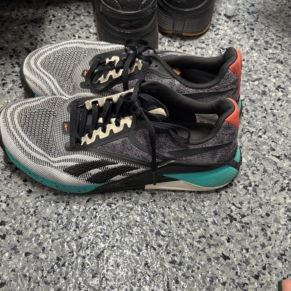 Reebok Sneakers in Black, White, and Teal